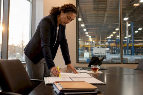 Facility manager reviewing maintenance schedules