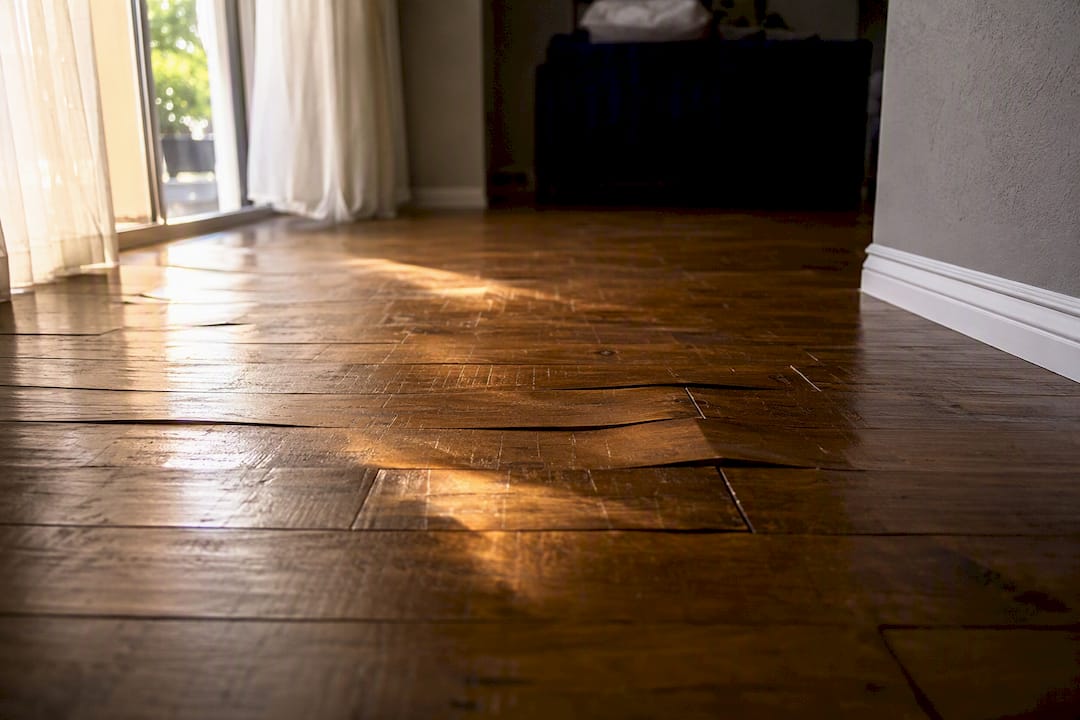 Warped wood floor from humidity damage